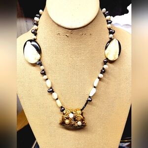 Elegant Gold and Black Necklace